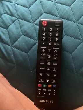 Samsung Black Remote with Red Power Button and Multi-Color Function Keys